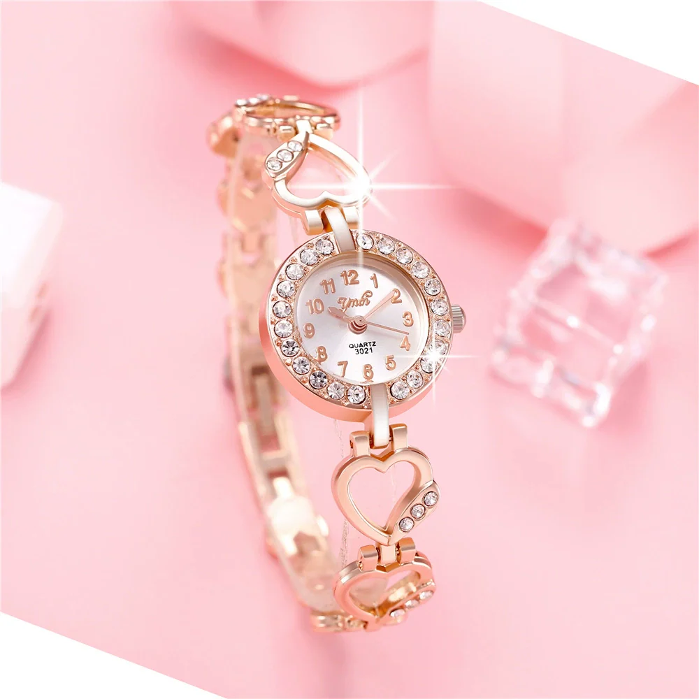 Alloy Fashion Heart String Bracelet Women's Quartz Watch With Round Dial