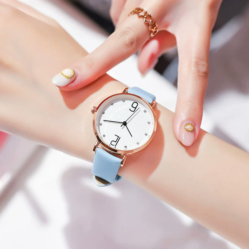 Fashion Women's Metal Case Quartz Watch With Imitation Leather Strap And Round Dial