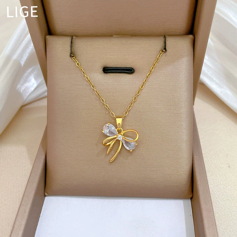 Stainless Steel And Copper Hollow Bow Geometric Light Luxury Style Full Diamond Necklace For Women