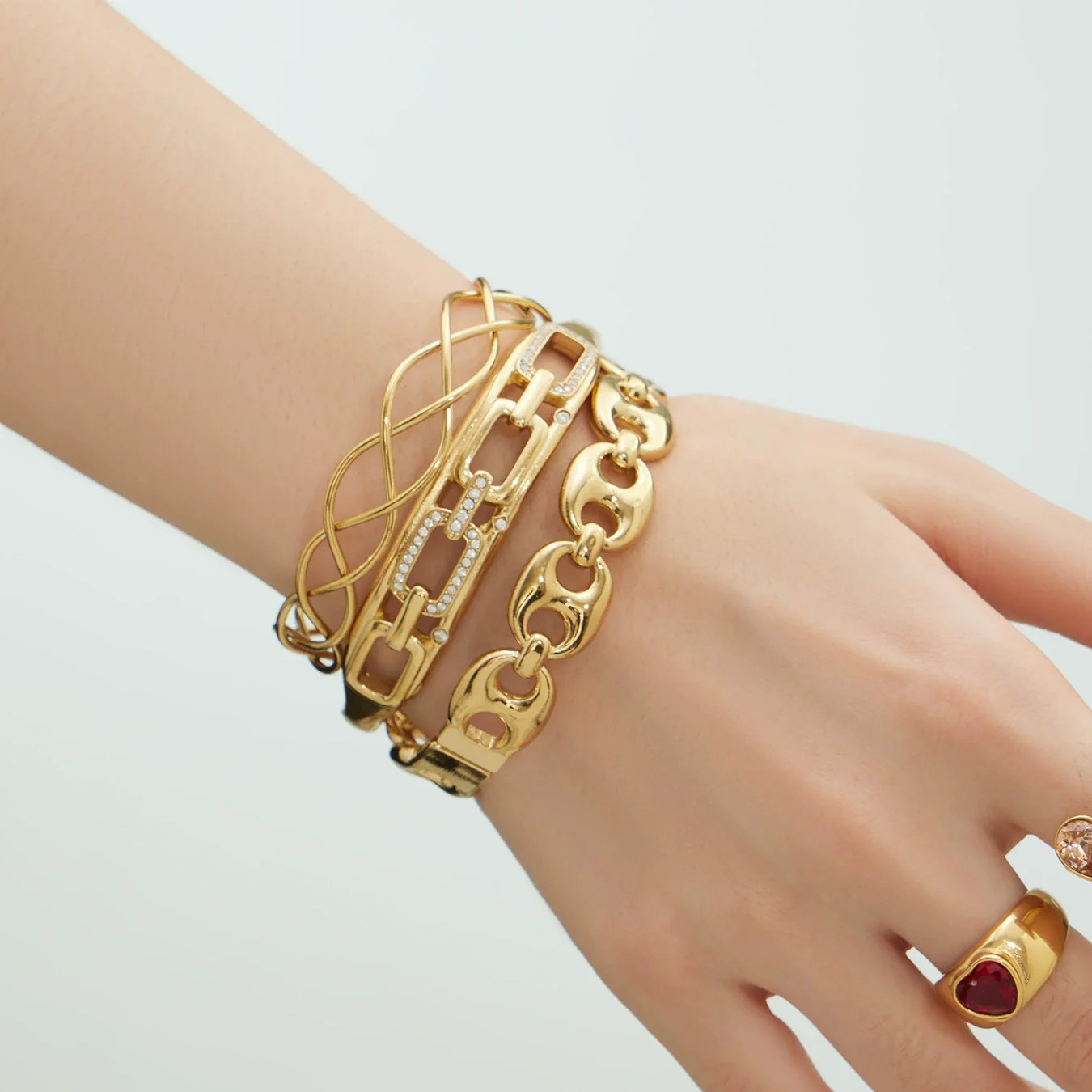 Wholesale 18K Goldplated Stainless Steel Geometric Cut Out Buckle Cross Opening Bracelet - Image 3