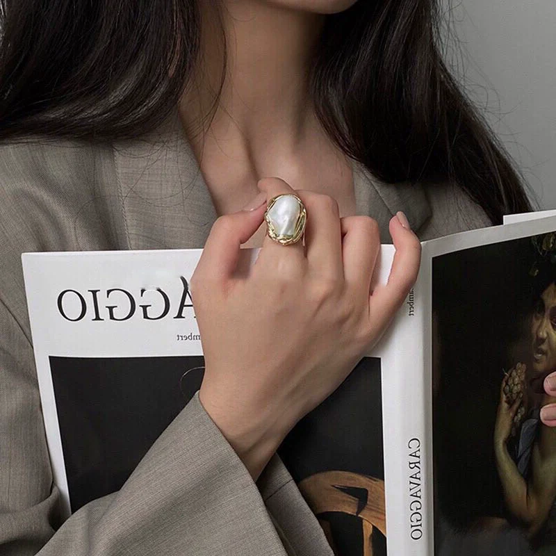 Wholesale Alloy Retro Geometric Asymmetrical Ushaped Pearl Ring For Women With Electroplating Treatment