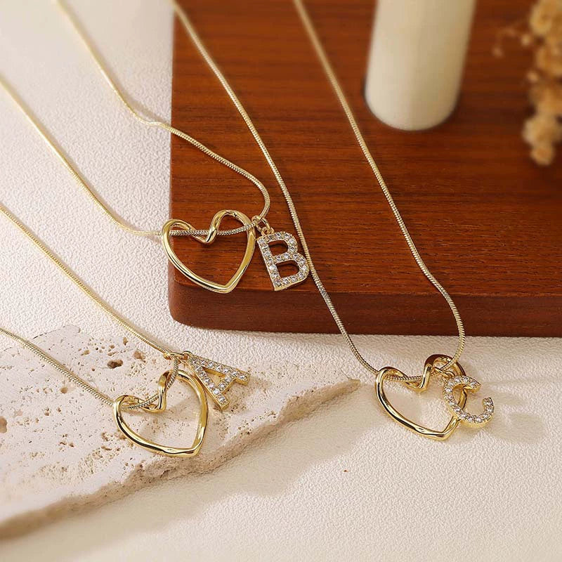 Wholesale Copper Inlaid Zircon Heart And Letter Pendant Necklace With Snake Bone Chain Fashion Style For Women