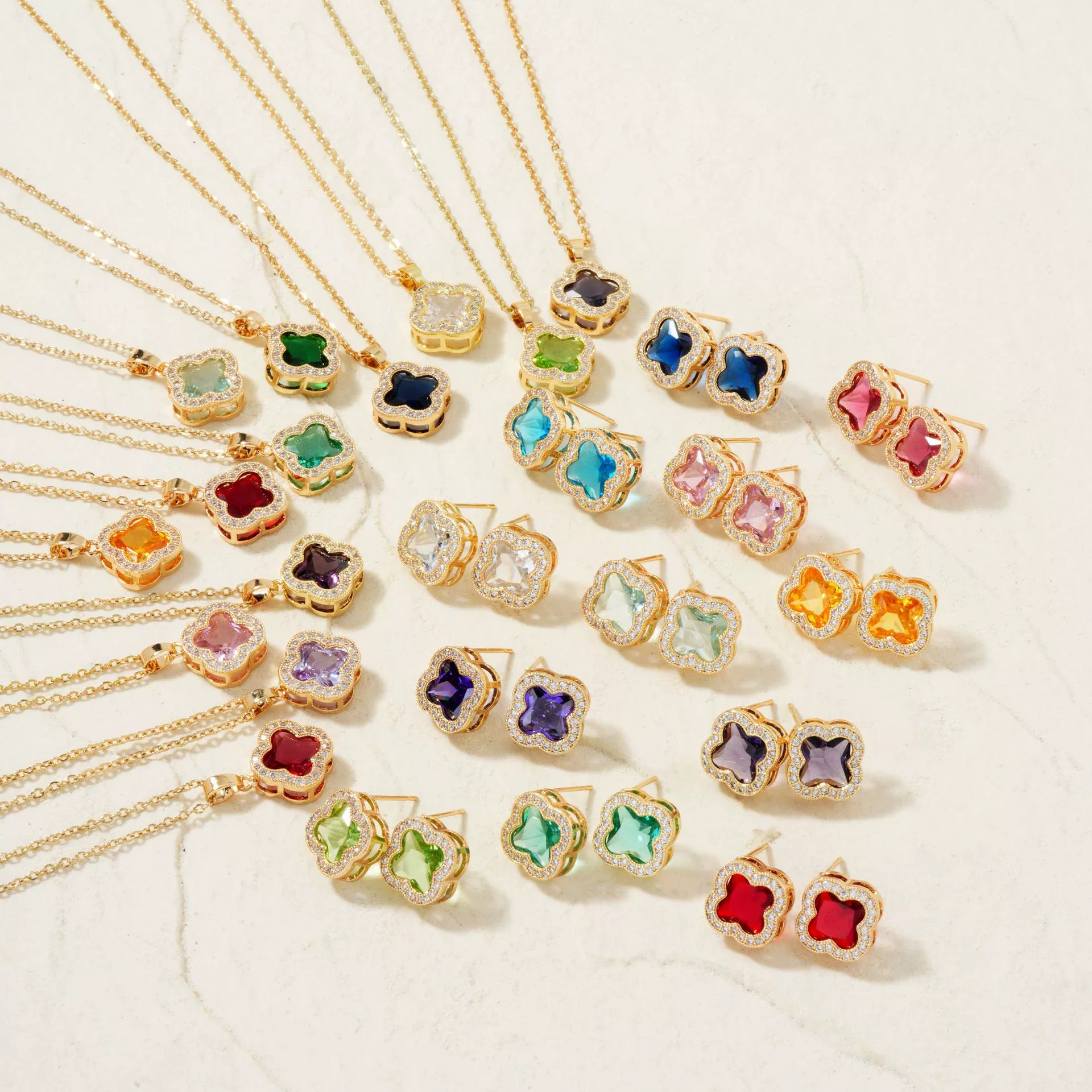 Wholesale Copper Inlaid Zircon Natural Plants And Flowers Style Fourleaf Clover Earrings And Necklace Twopiece Jewelry Set