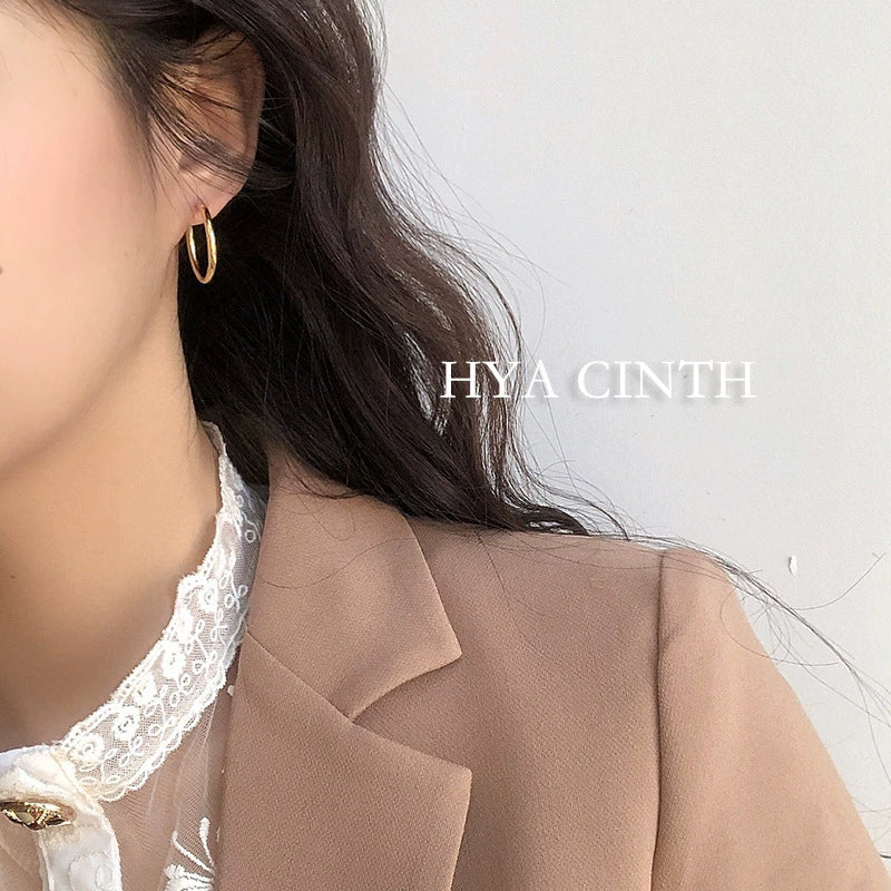 Wholesale Copper Simple Geometric Round Hollow Earrings For Women With Real Gold Plating - Image 2