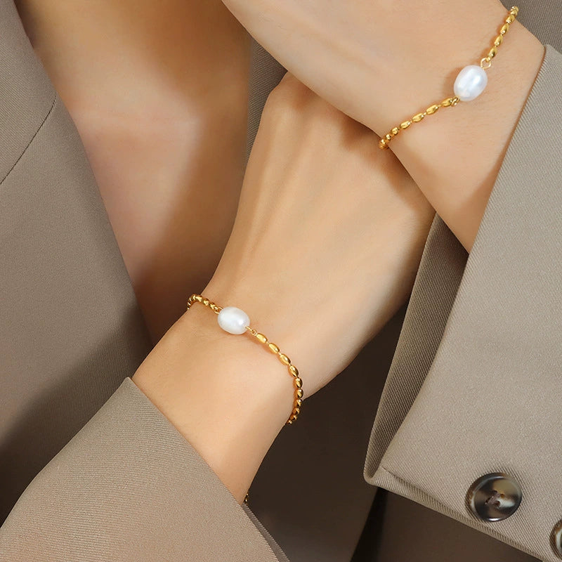 Wholesale Freshwater Pearl Stitching Rice Bead Titanium Steel Electroplated Flower Pattern Metal Chain Bracelet For Women