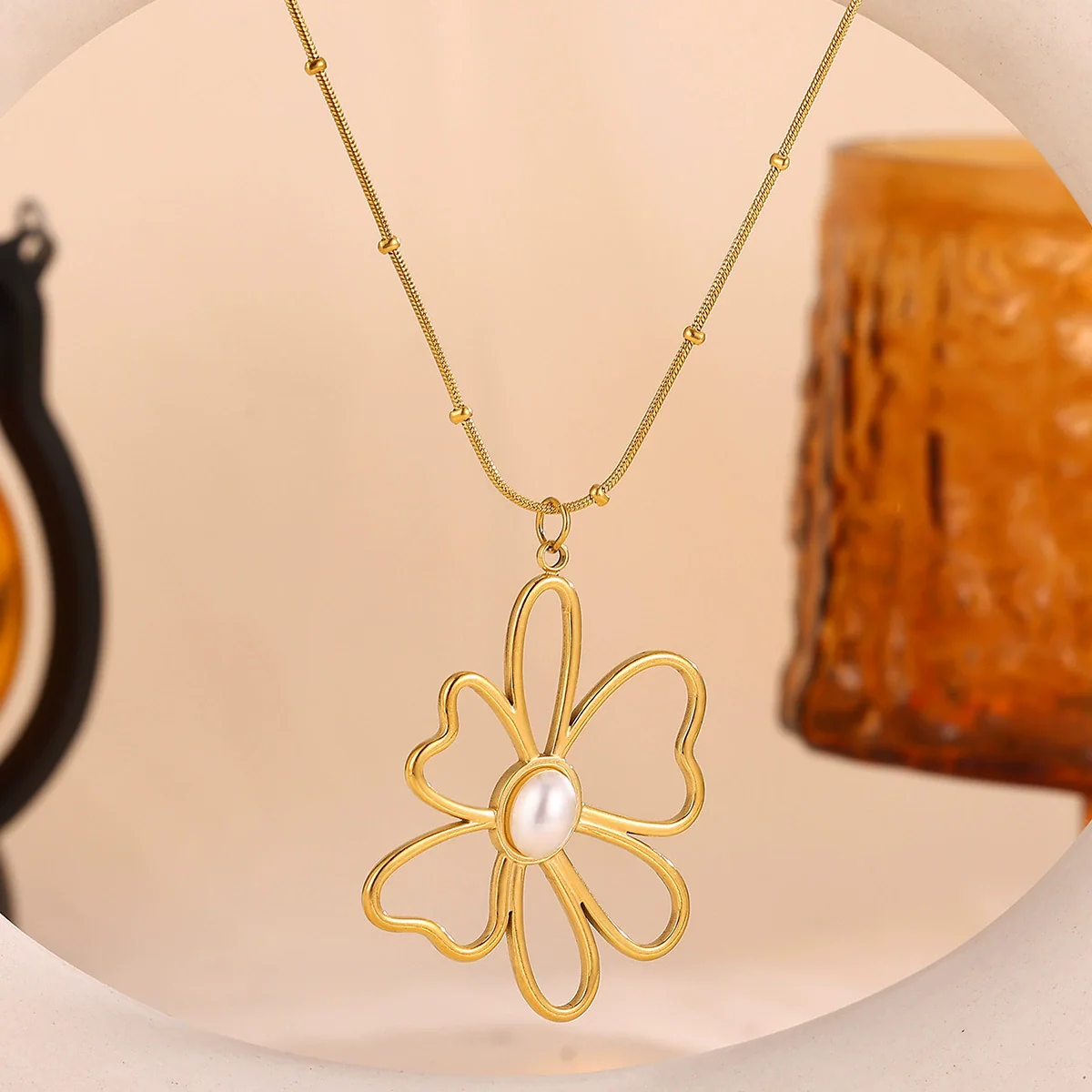 Wholesale Gold Electroplated Stainless Steel Hollow Flower Pendant Necklace With Cross Chain For Unisex - Image 2
