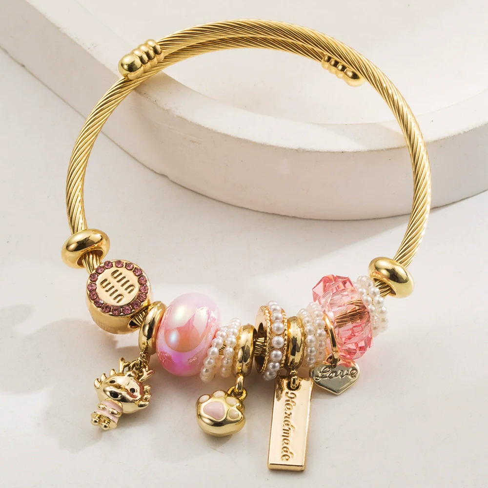 Wholesale Golden Stainless Steel Alloy Women's Bracelet With Diamond Treatment And Small Animal Pendant - Image 7