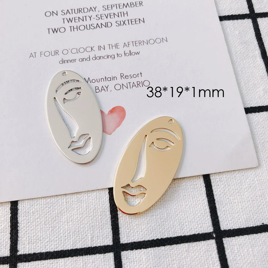 Wholesale Jewelry Accessories Alloy Electroplated Abstract Face Pendant Earrings - Image 2