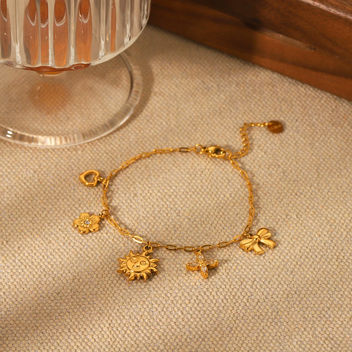 Wholesale Jewelry Goldplated Stainless Steel Heart Shape Geometric Bow Flower Cut Out Pendant Bracelet For Women - Image 4