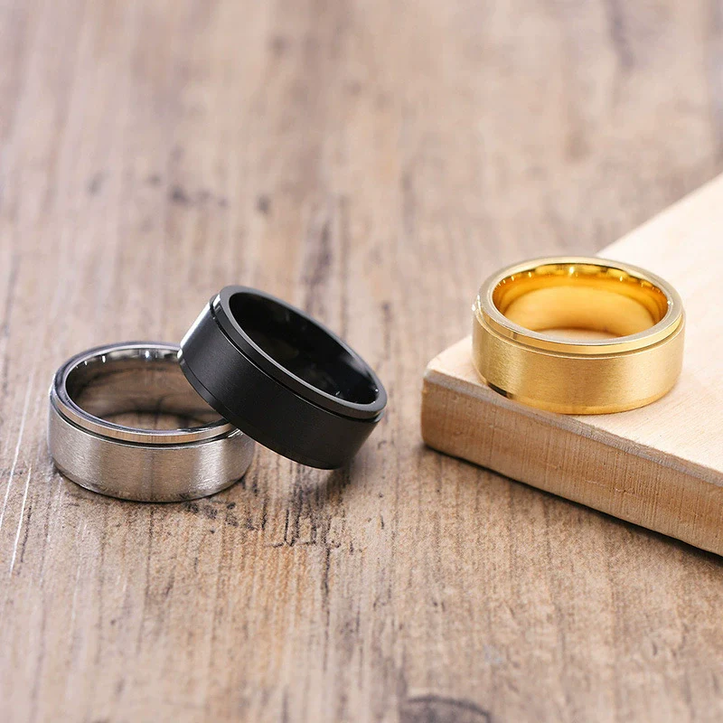 Wholesale Men's Titanium Steel Rotary Decompression Ring With Geometric Pattern And Electroplating Treatment