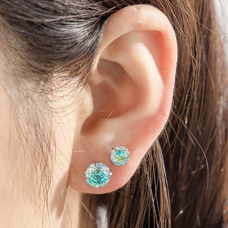 Wholesale Metal Sweet Style Flower Shape Zirconia Inlaid Titanium Steel Ear Nails For Women