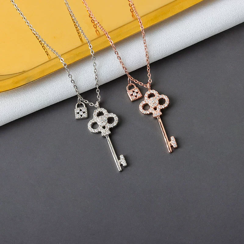 Wholesale S925 Sterling Silver Key Lock Necklace For Women With Cross Chain And Electroplating Treatment