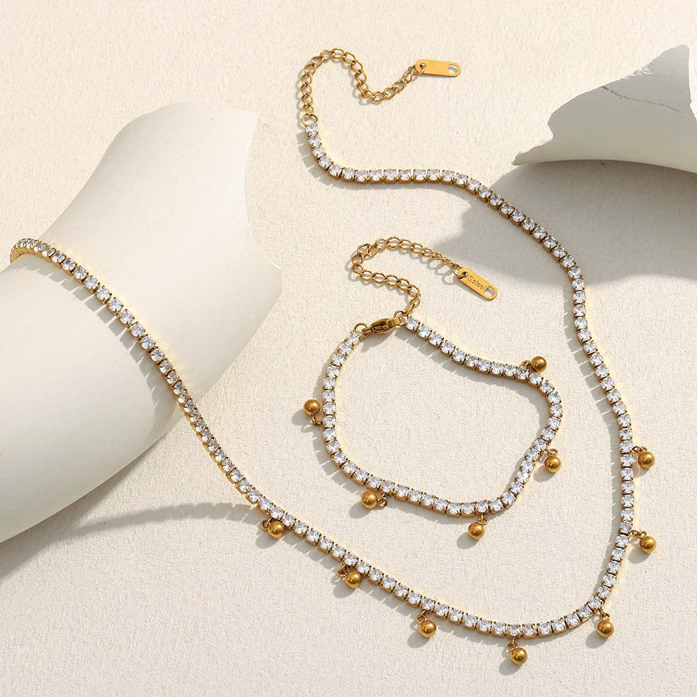 Wholesale Simple Geometric Stainless Steel And Titanium Steel 18K Gold Plated Zircon Ball Tassel Necklace And Bracelet Set For Women