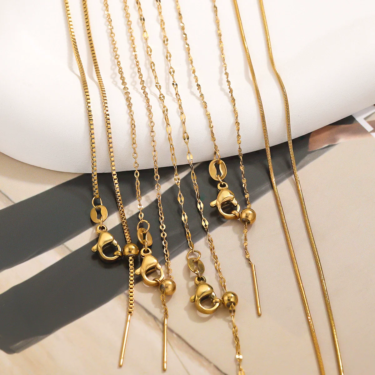 Wholesale Stainless Steel And Titanium Steel Ochain Clavicle Necklace With Geometric Beaded Pendant And Real Gold Plating For Women