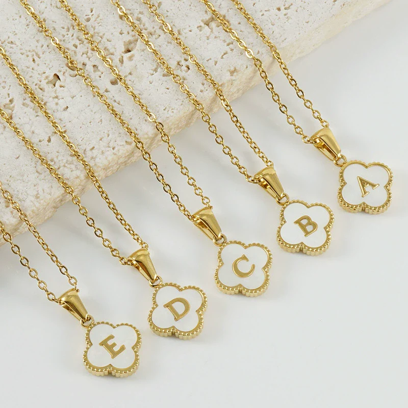 Wholesale 316L Stainless Steel Fourleaf Clover Pendant Necklace With Electroplating Treatment And Letter Pattern For Women