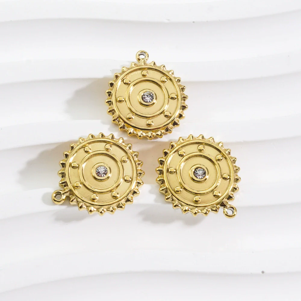 Wholesale Stainless Steel Zircon Inlaid Round Pendant And Earrings With Electroplating Treatment