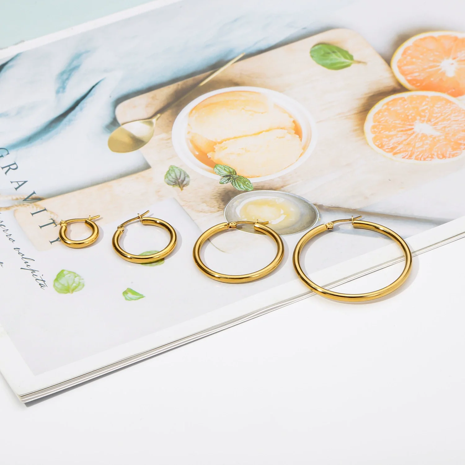 Wholesale Titanium Steel And Stainless Steel Hollow Crescent Earrings With 18K Gold Electroplating - Image 4
