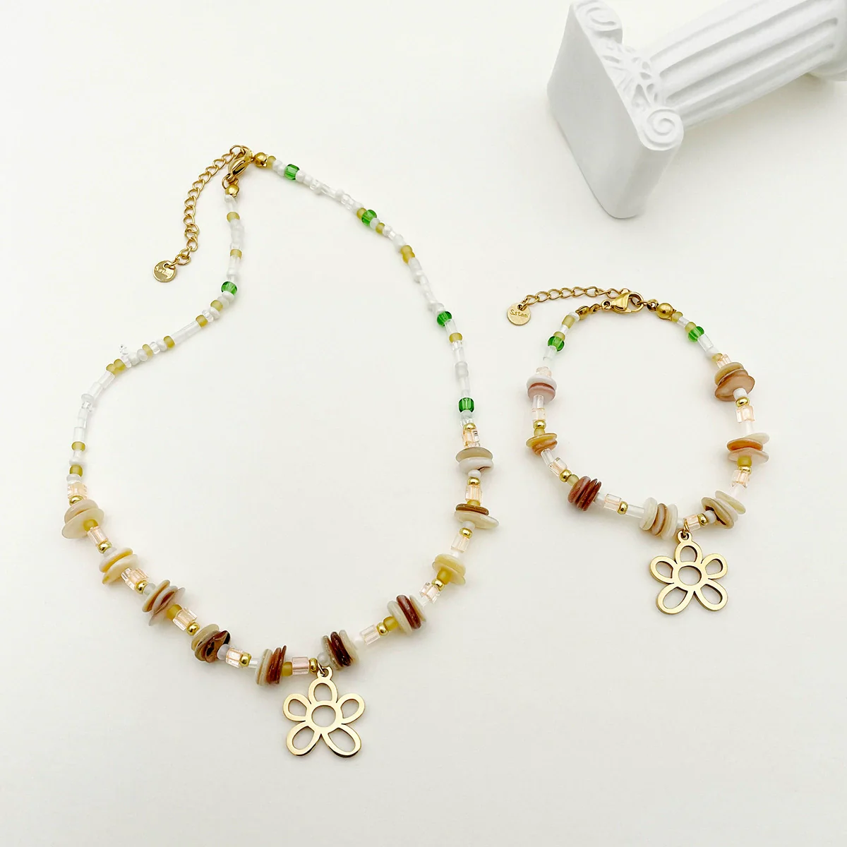 Wholesale Titanium Steel Irregular Hollow Flower Handmade Beaded Necklace And Bracelet Set With Electroplating For Women - Image 2