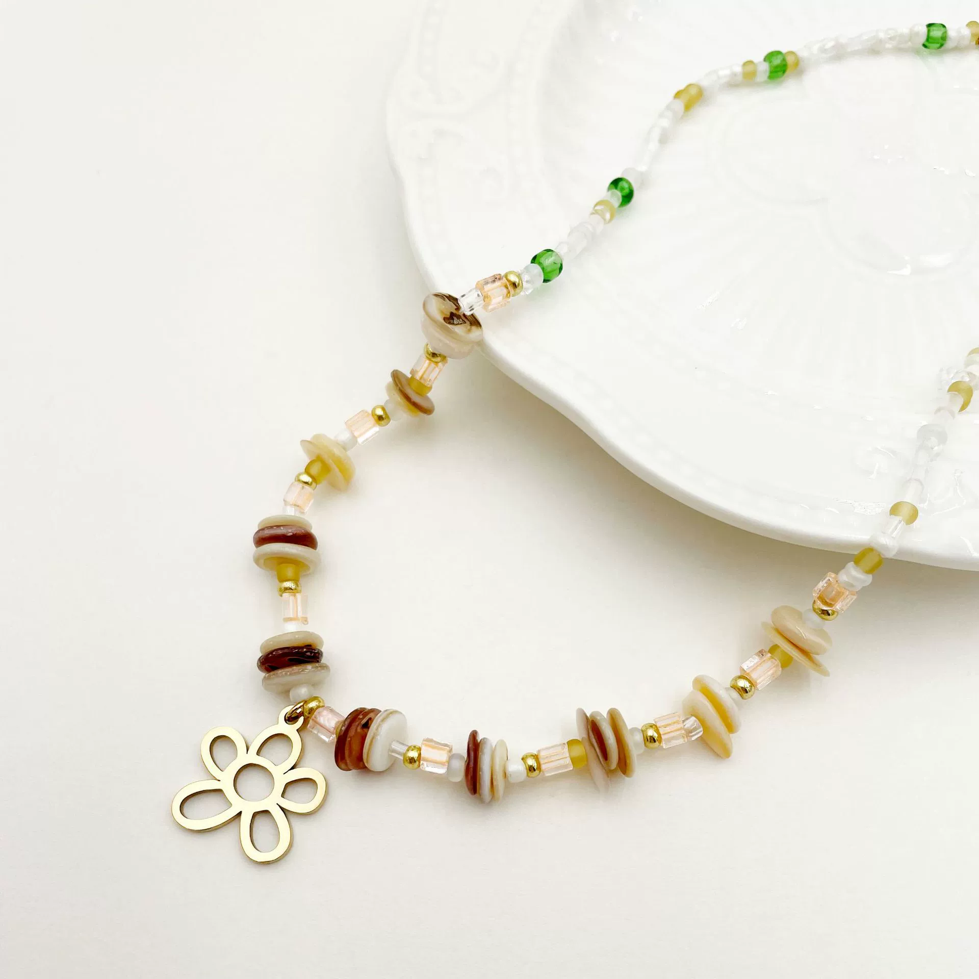 Wholesale Titanium Steel Irregular Hollow Flower Handmade Beaded Necklace And Bracelet Set With Electroplating For Women - Image 4