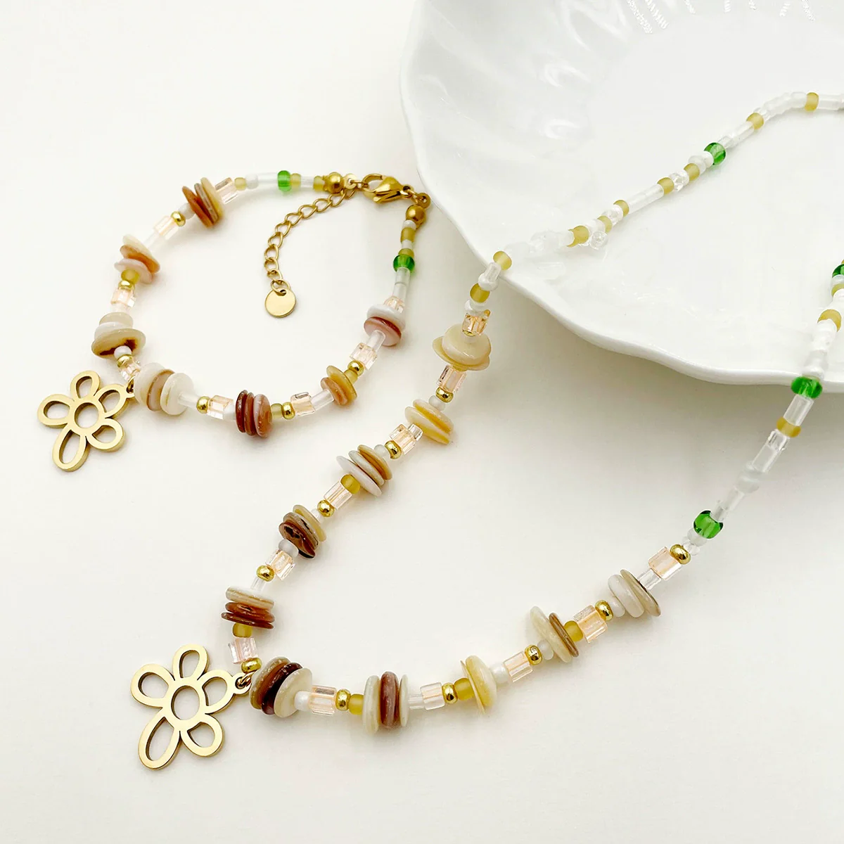 Wholesale Titanium Steel Irregular Hollow Flower Handmade Beaded Necklace And Bracelet Set With Electroplating For Women - Image 7