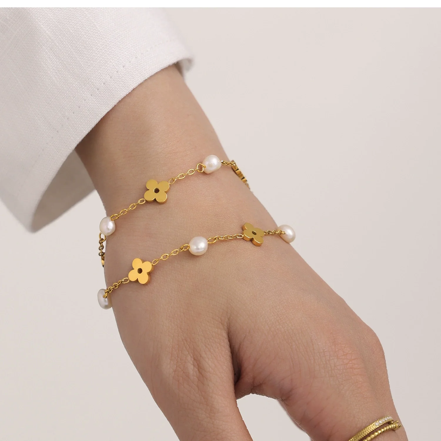 Wholesale Unisex Ferris Wheel Four Leaf Flower Electroplated Titanium Steel Necklace And Bracelet Jewelry - Image 3