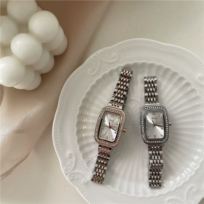 Wholesale Women's Alloy Case Quartz Watch With Rhinestone Oval Dial And Refined Steel Belt Business Style