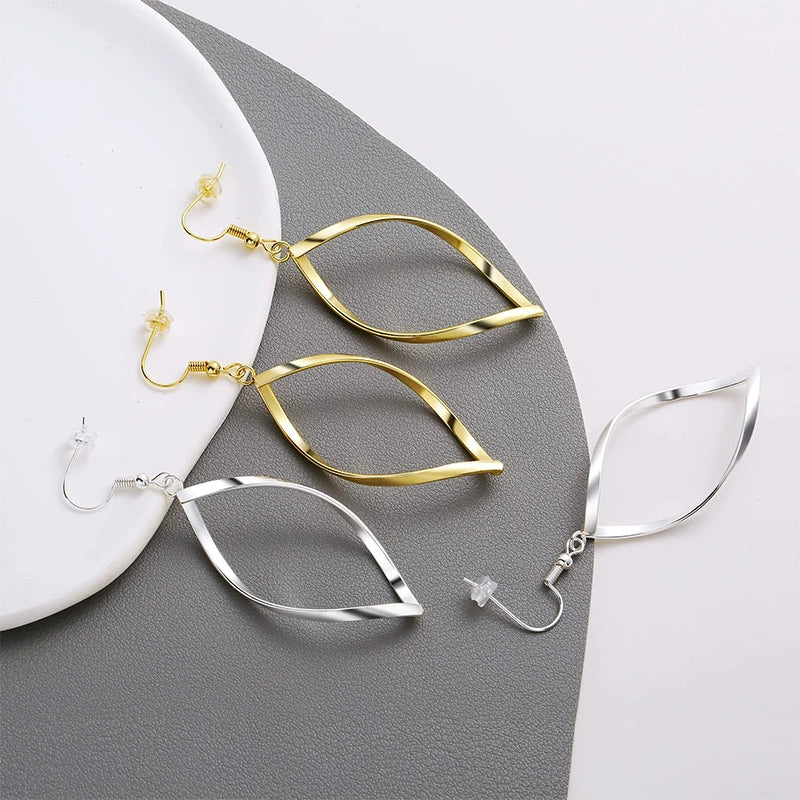 Wholesale Women's Copper Geometric Spiral Hollow Leaf Electroplated Earrings - Image 2
