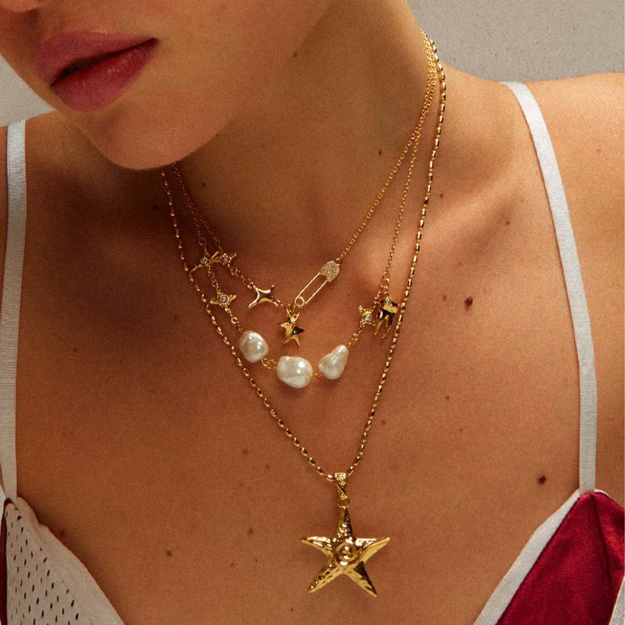 Wholesale Women's Doublelayer Asymmetrical Pearl Light Zircon Necklace With Geometric Pattern Copper Chain And Titanium Steel Pendant Electroplated In 18K Gold Color Preservation