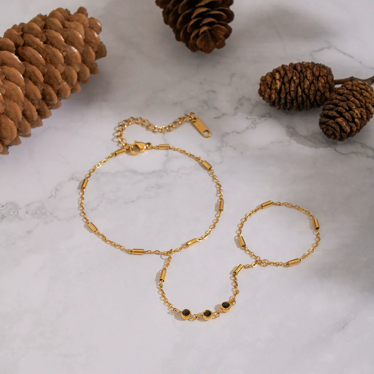 Wholesale Women's Elegant Geometric Stainless Steel Real Gold Plated Finger Chain Bracelet