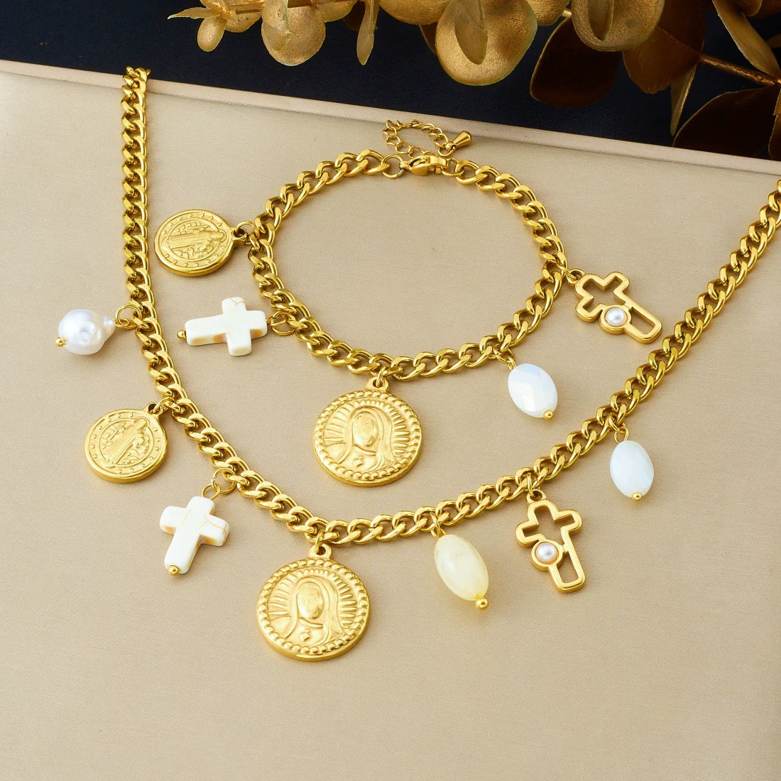 Wholesale Women's Fashion Elegant Retro Pearl Cross Oval Relief Saint Crown Roman Numerals Pattern Stainless Steel Electroplated Pendant Necklace And Hand Jewelry Set