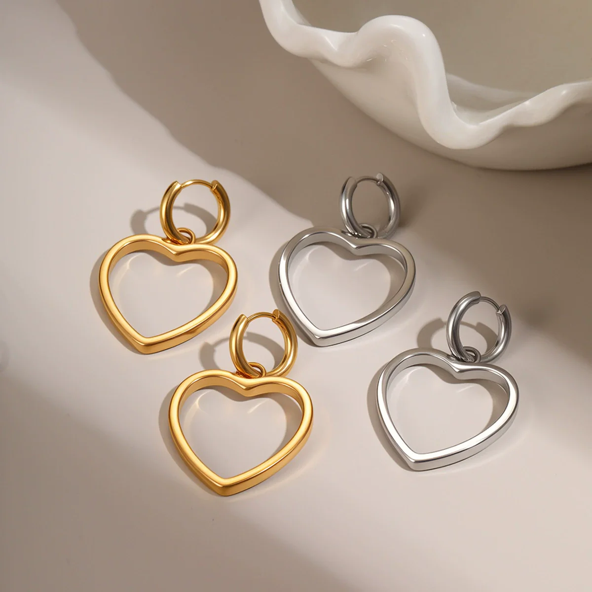 Wholesale Women's Fashion Heartshaped Hollow Electroplated Stainless Steel Earrings - Image 2