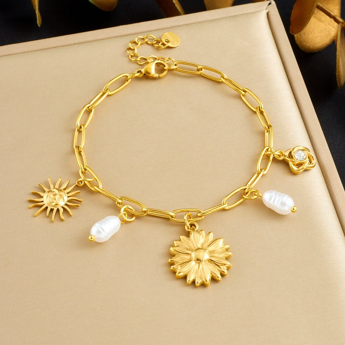Wholesale Women's Fashion Pearl Flower Stainless Steel Goldplated Bracelet With Cross Chain And Sun Face Pendant
