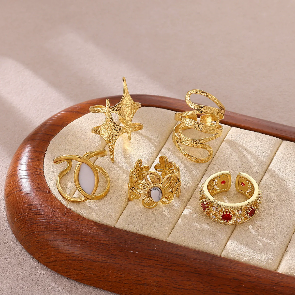 Wholesale Women's Geometric Hollow Flower Goldplated Inlaid With Gold Stainless Steel Zircon Ring With Fruit Shape And Pattern Light Luxury Style - Image 4
