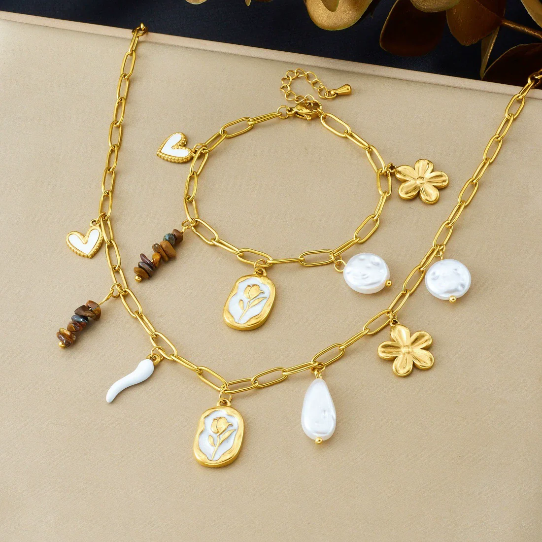 Wholesale Women's Geometric Pearl Tiger Eye Stone Pendant Flower Heart Stainless Steel Electroplated Accessories Set With Plants And Flowers Pattern