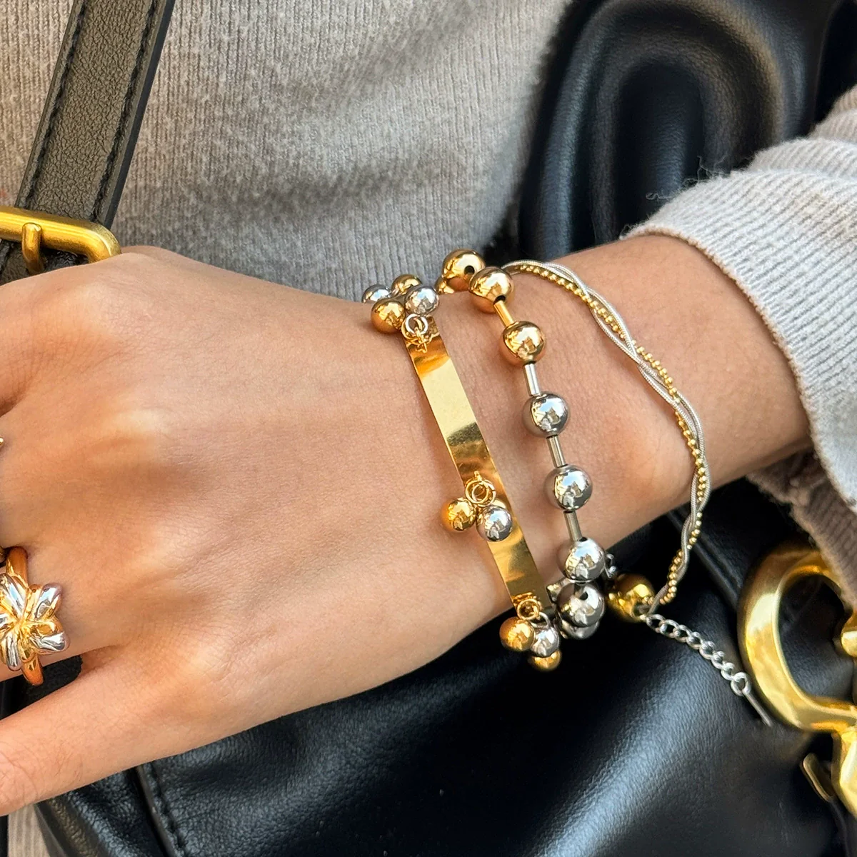 Wholesale Women's Ins Style Geometric Stainless Steel Electroplated Snake Bone Chain Threelayer Wrapped Ball Bracelet