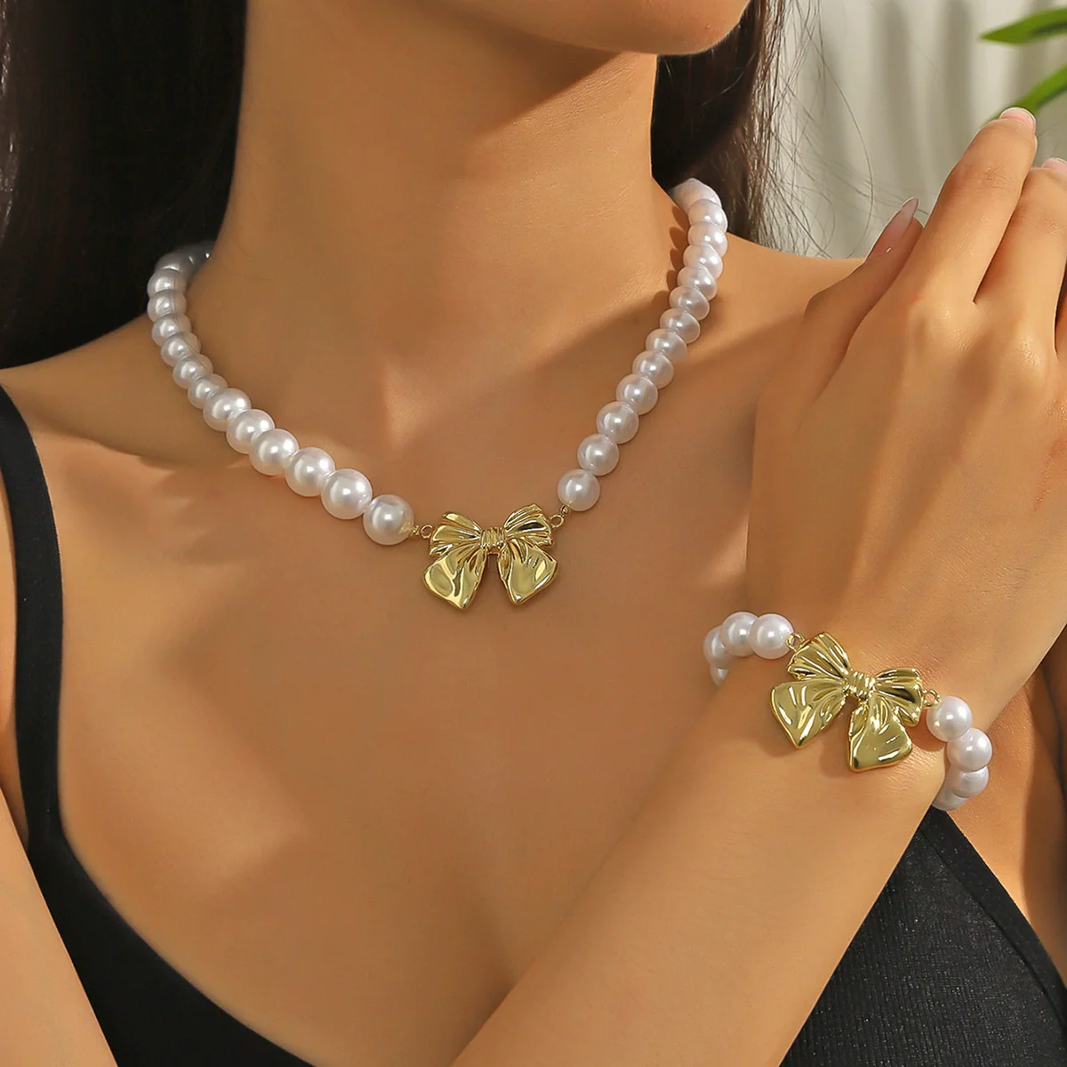 Wholesale Women's Jewelry Alloy Imitation Pearl Bow Geometric Necklace With Electroplating