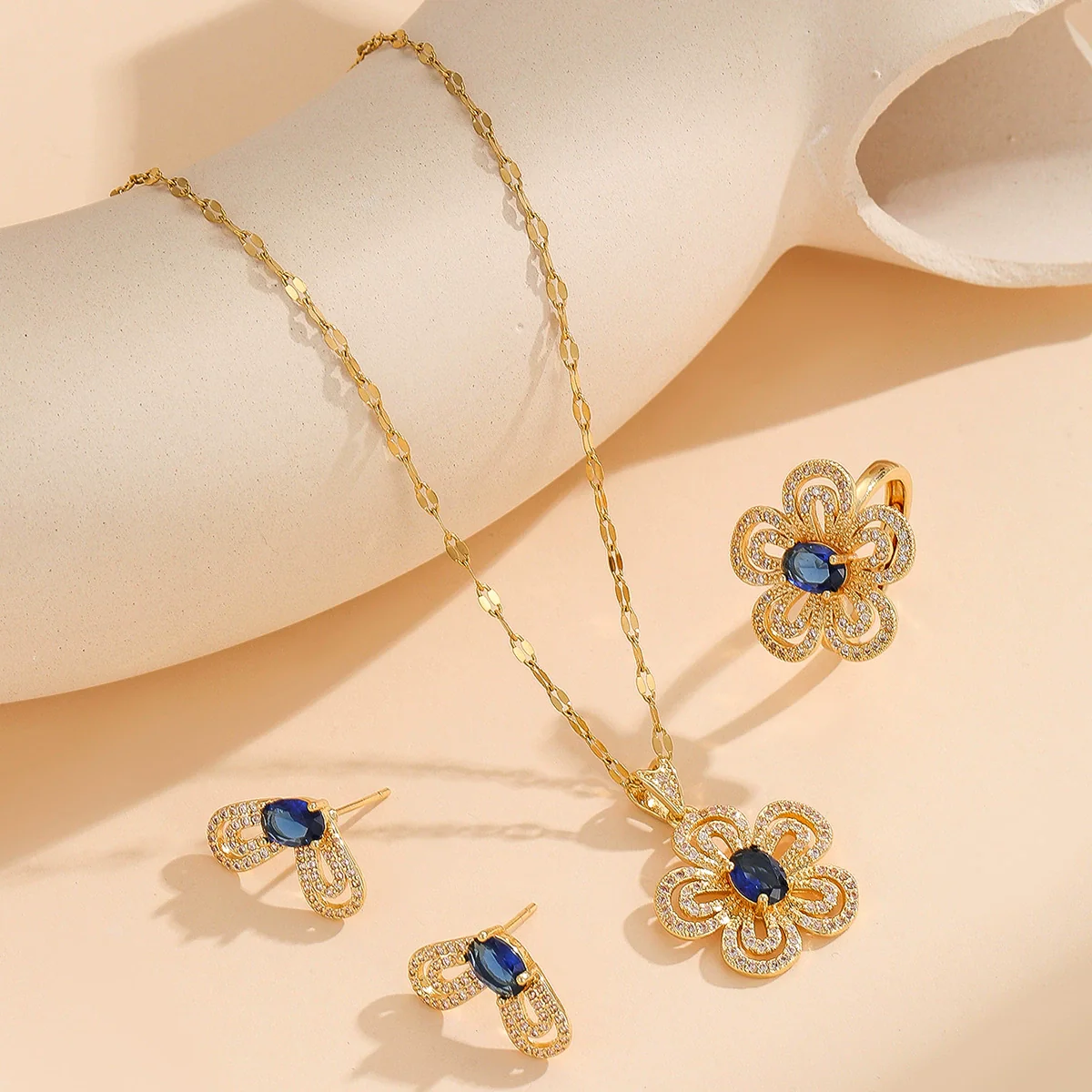 Wholesale Women's Jewelry Set Titanium Steel Flower Shaped With Sea Blue Gemstone Inlaid And Electroplating