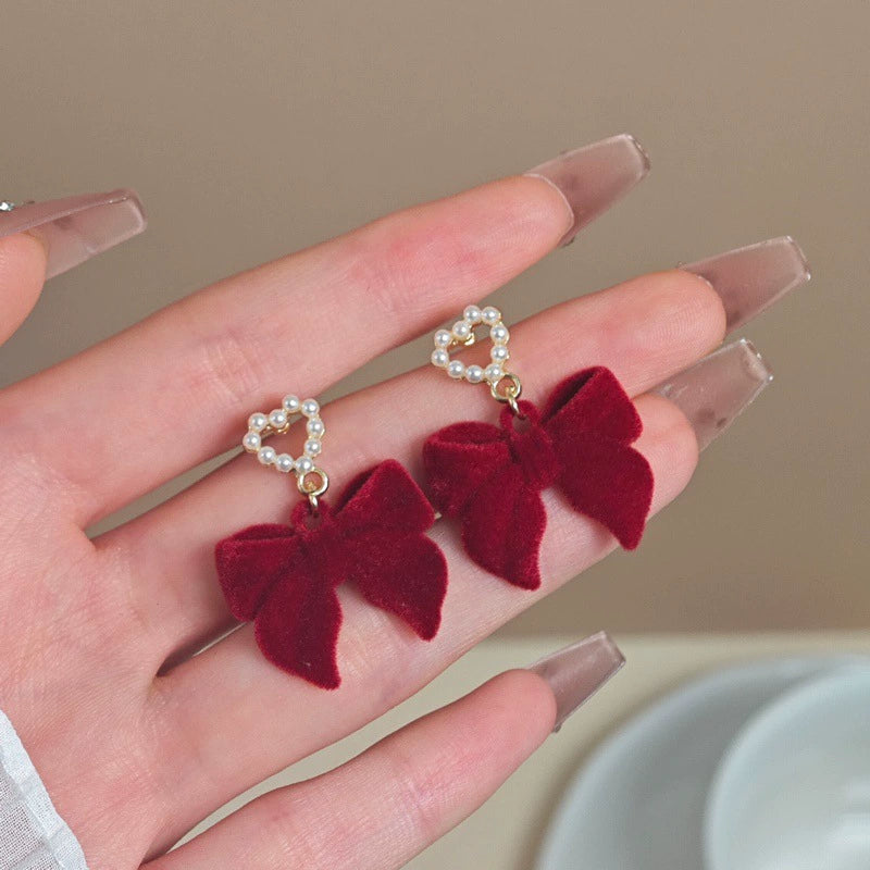 Wholesale Women's Light Luxury Flocking Bow And Heart Zinc Alloy Earrings With Electroplating Treatment - Image 2