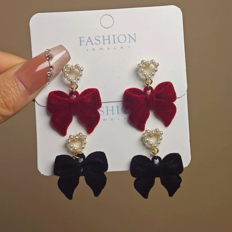 Wholesale Women's Light Luxury Flocking Bow And Heart Zinc Alloy Earrings With Electroplating Treatment - Image 3
