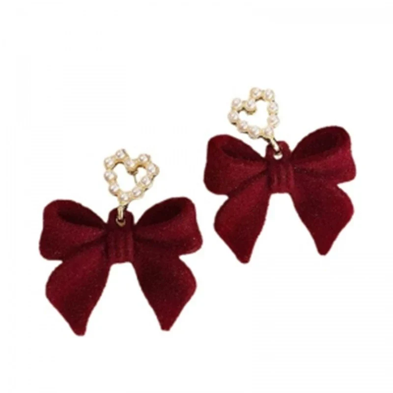 Wholesale Women's Light Luxury Flocking Bow And Heart Zinc Alloy Earrings With Electroplating Treatment - Image 5