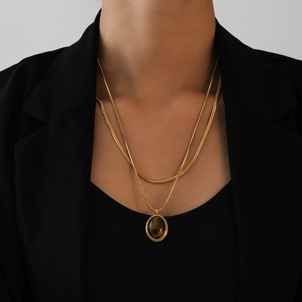 Wholesale Women's Light Luxury Geometric Pattern Oval Tiger Eye Stone Stainless Steel Electroplated Pendant Necklace For Autumn And Winter