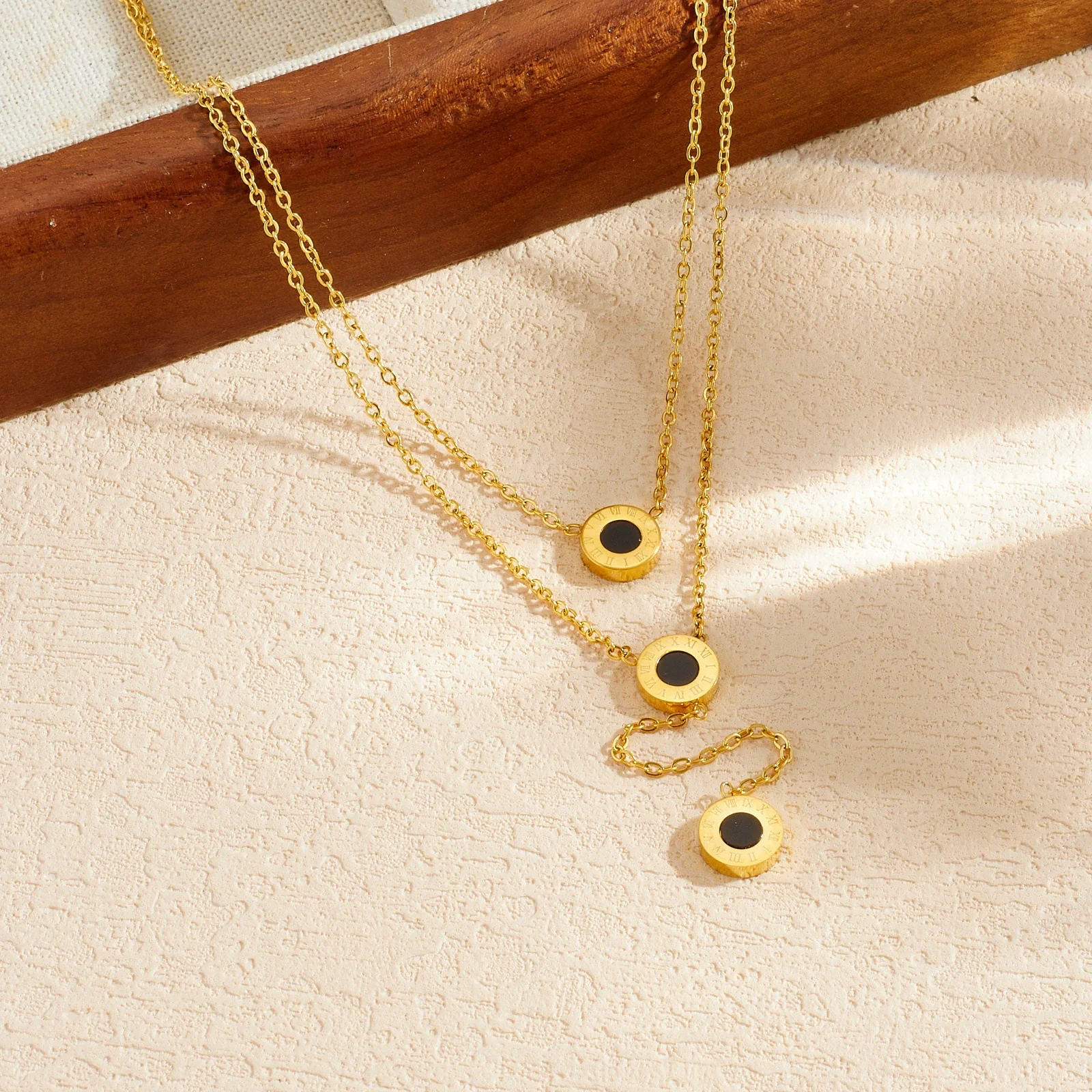Wholesale Women's Light Luxury Style Gold Plated Stainless Steel Layered Necklace With Black Round And Roman Numeral Pendants - Image 3