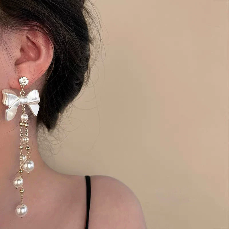 Wholesale Women's Metal Electroplated Bow Shape Pearl Tassel Earrings Light Luxury Style - Image 4