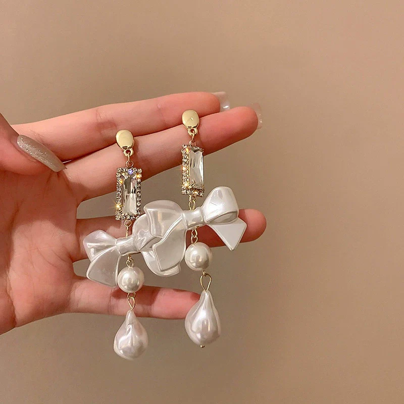 Wholesale Women's Metal Electroplated Bow Shape Pearl Tassel Earrings Light Luxury Style - Image 7