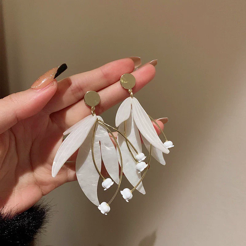 Wholesale Women's Metal Electroplated Bow Shape Pearl Tassel Earrings Light Luxury Style - Image 9