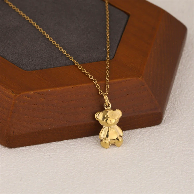 Wholesale Women's Minimalist Geometric Stainless Steel 18K Gold Electroplated Bear Pendant Cross Chain Necklace