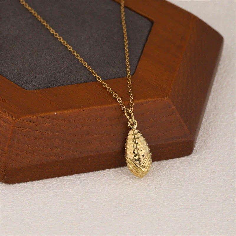 Wholesale Women's Minimalist Geometric Stainless Steel 18K Gold Electroplated Corn Shape Water Drop Pendant Necklace With Cross Chain - Image 2