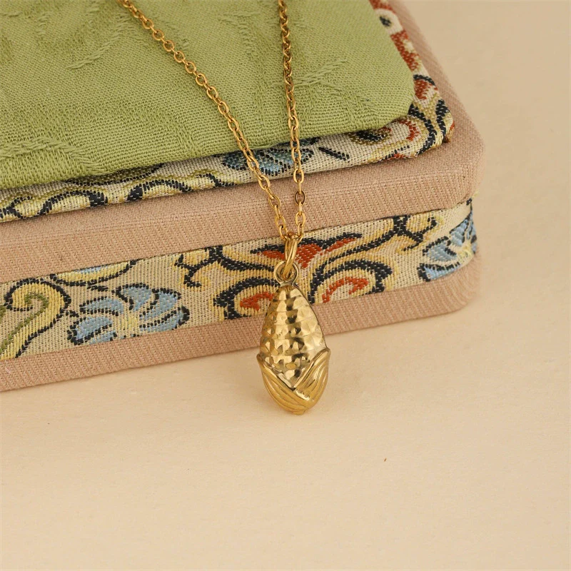 Wholesale Women's Minimalist Geometric Stainless Steel 18K Gold Electroplated Corn Shape Water Drop Pendant Necklace With Cross Chain - Image 3