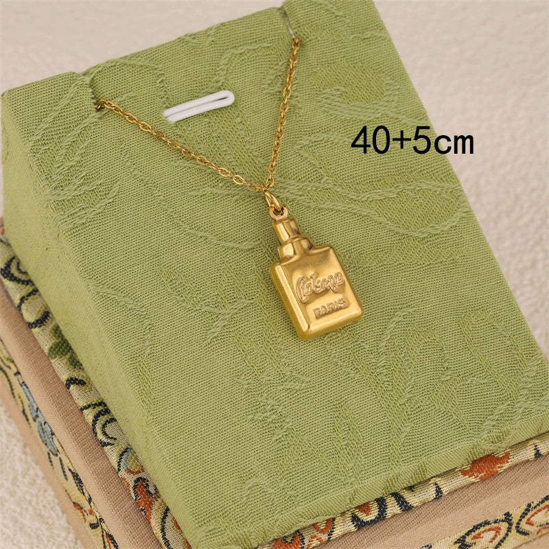 Wholesale Women's Minimalist Geometric Stainless Steel 18K Gold Plated Perfume Bottle Pendant Necklace With Cross Chain - Image 2