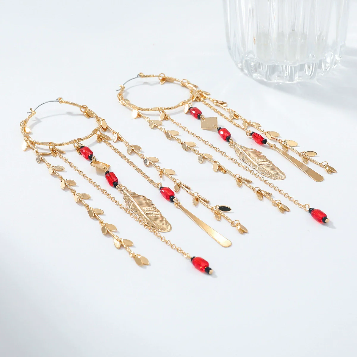 Wholesale Women's Minimalist Geometric Zinc Alloy Exaggerated Tassel Feather Multilayer Earrings With Electroplating - Image 4